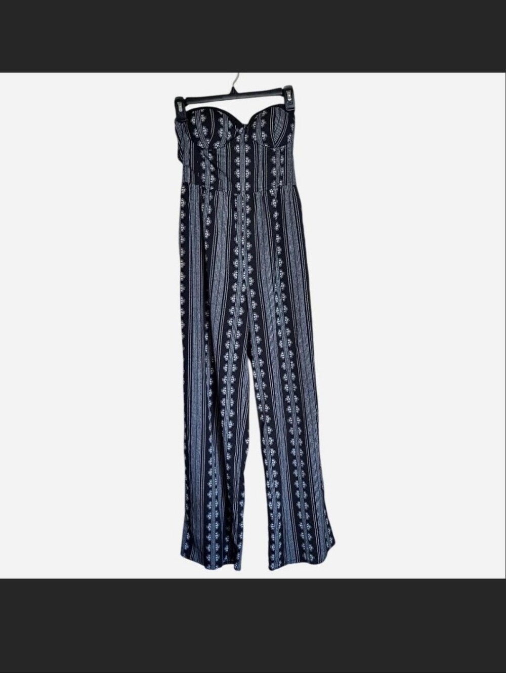 Black and white floral strapless jumpsuit with wide leg pants